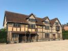 Māja pretī Šekspīra dzimšanas vietai Stratfordā pie Eivonas