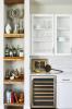 Mājas skaistas virtuves apaļais galds: kā dizaineri paliek organizēti